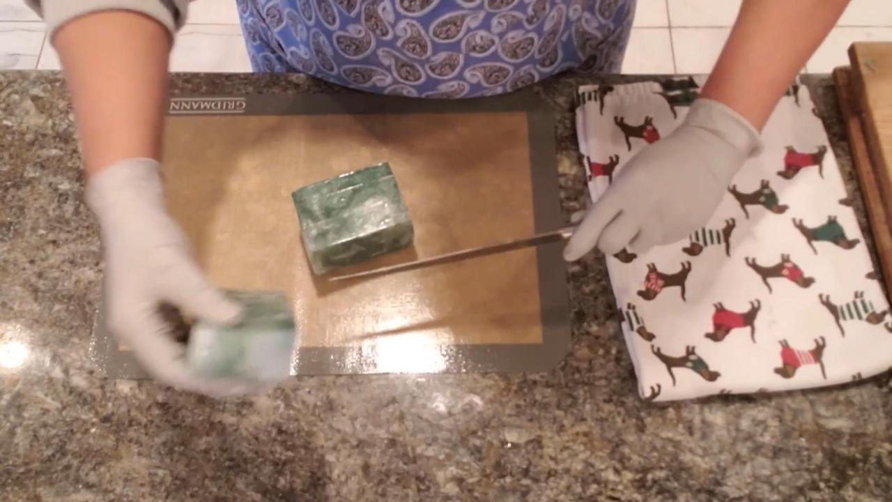 Cutting the green and pearl swirl soap