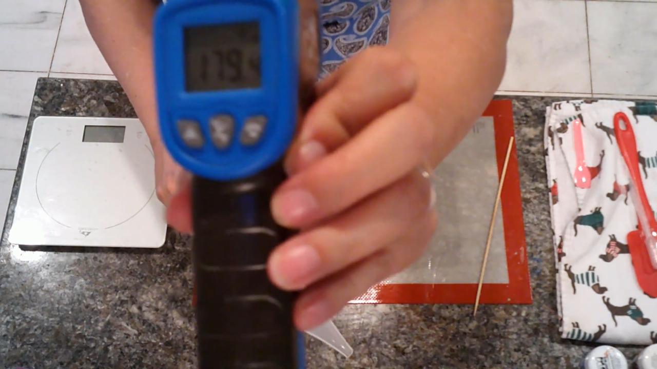 Checking the temperature of the white soap