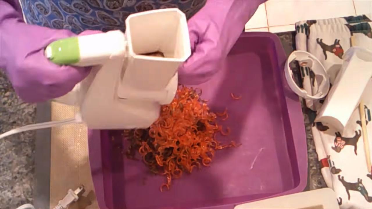 Shredding colored soap with a salad shooter