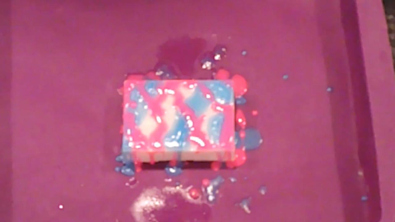 Pink and blue drizzle dripping down the sides