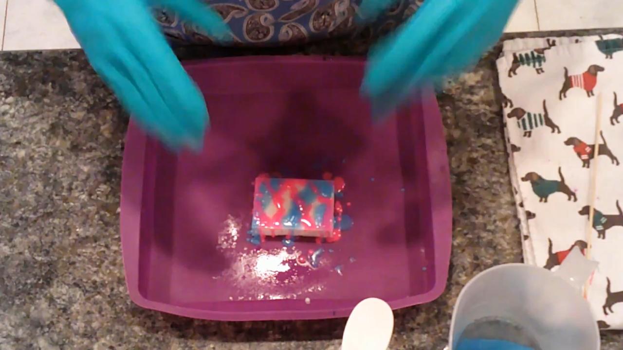 Soap bar covered in pink and blue drizzle