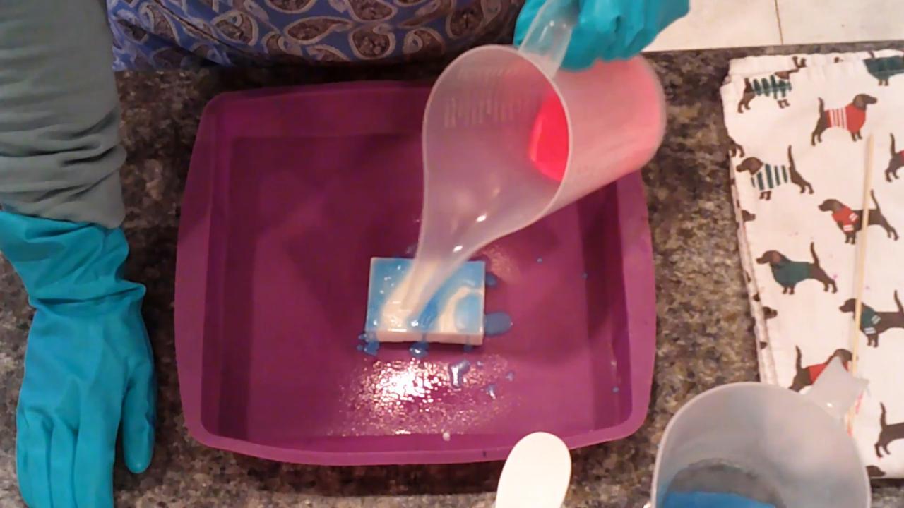 Adding more pink drizzle to the soap