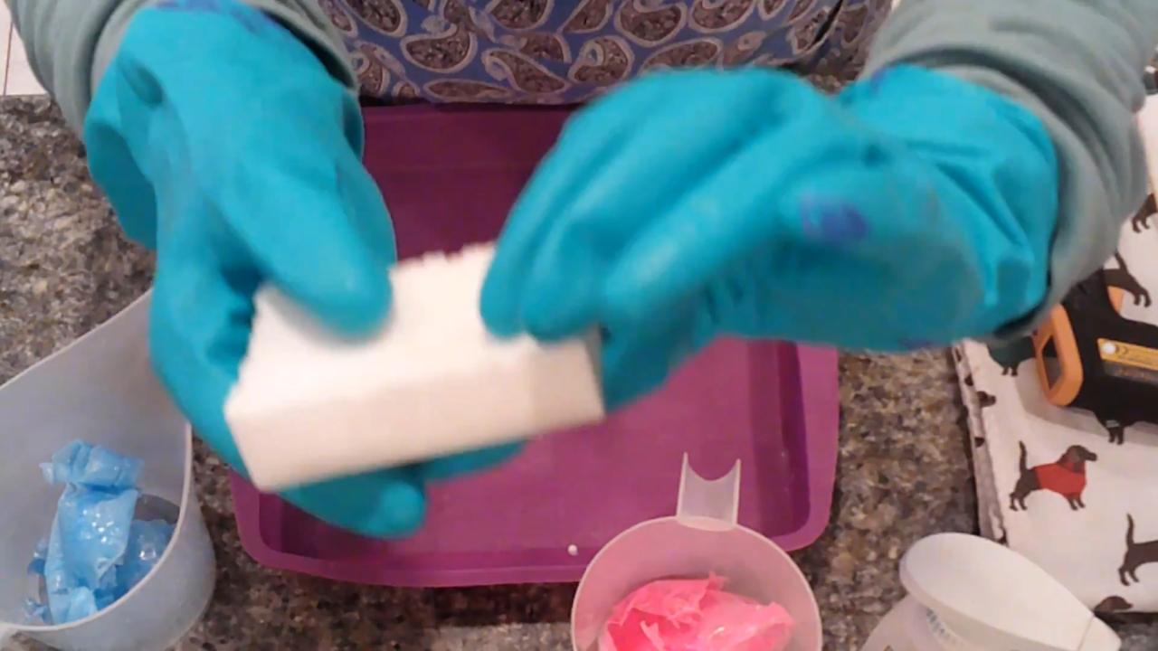 Scoring the top of the white soap bar