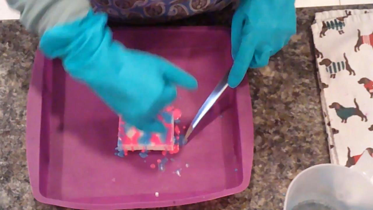 Trimming the drizzle soap with a knife