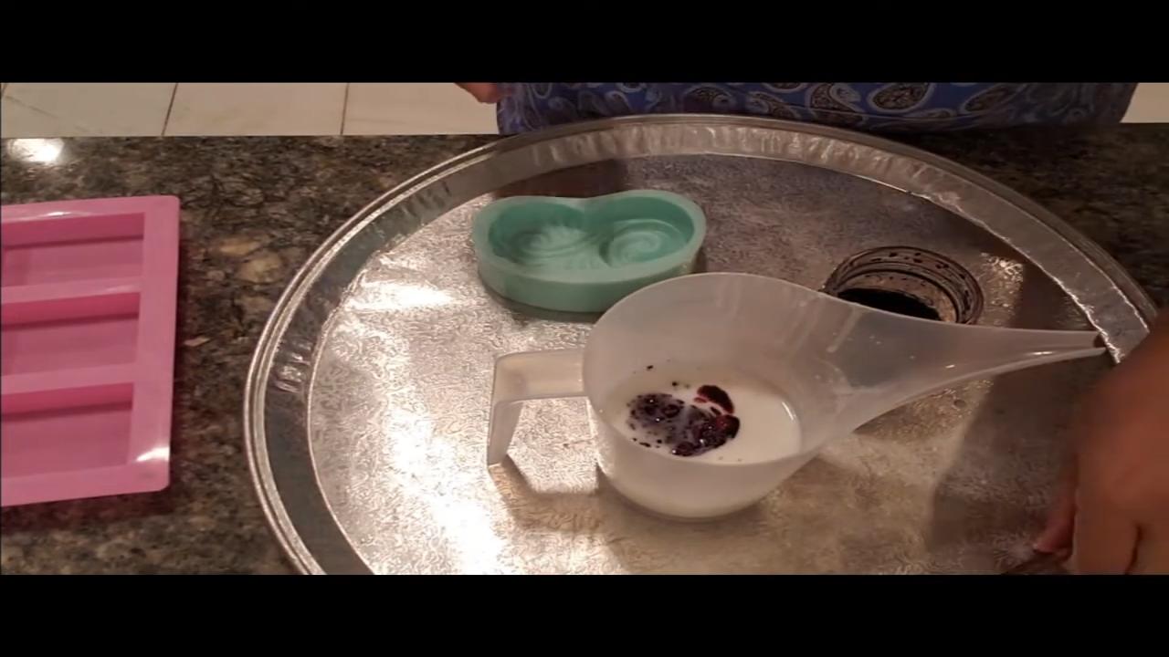 Dropping black cherry color into the soap
