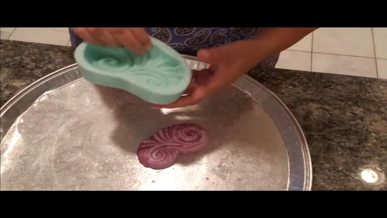 Cloud wave soap next to its silicone mold