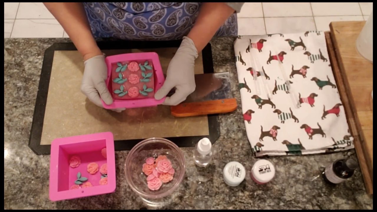 Unmolding the blooming roses soap loaf with embeds on top