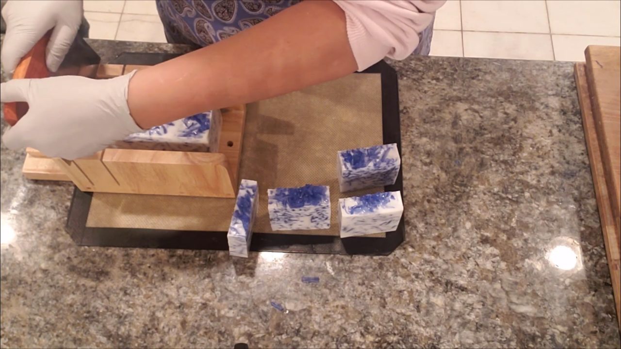 Cut blue confetti melt and pour soap bars