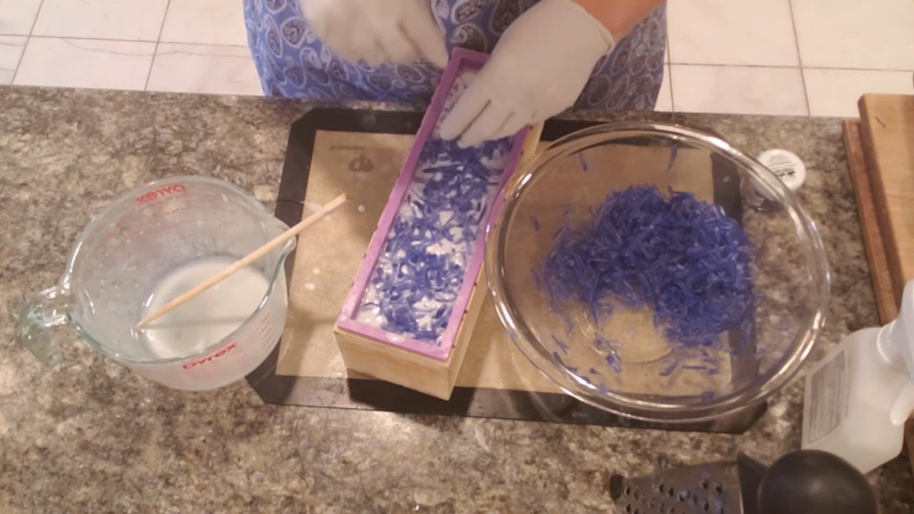 Drizzling soap over the top shreds to hold them in place