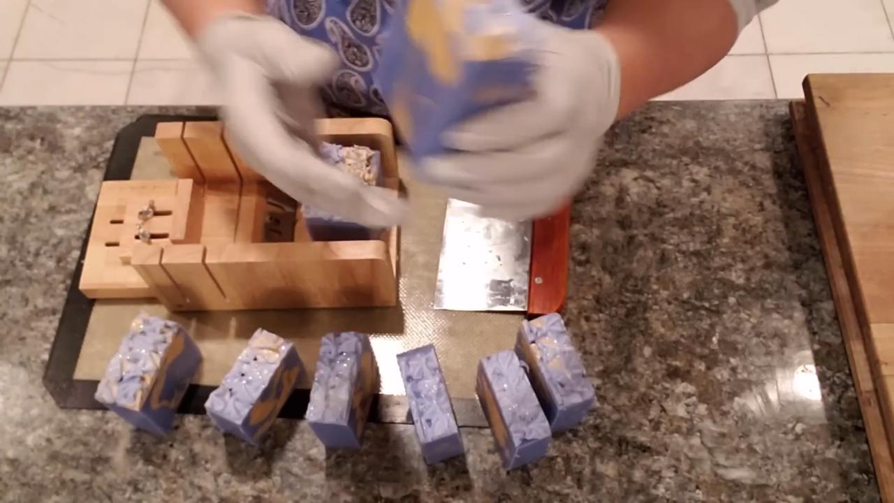 Finished blue and gold melt and pour soap with piped frosting
