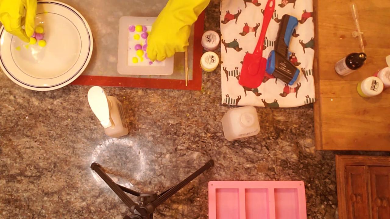 Square mold full of soap ball embeds