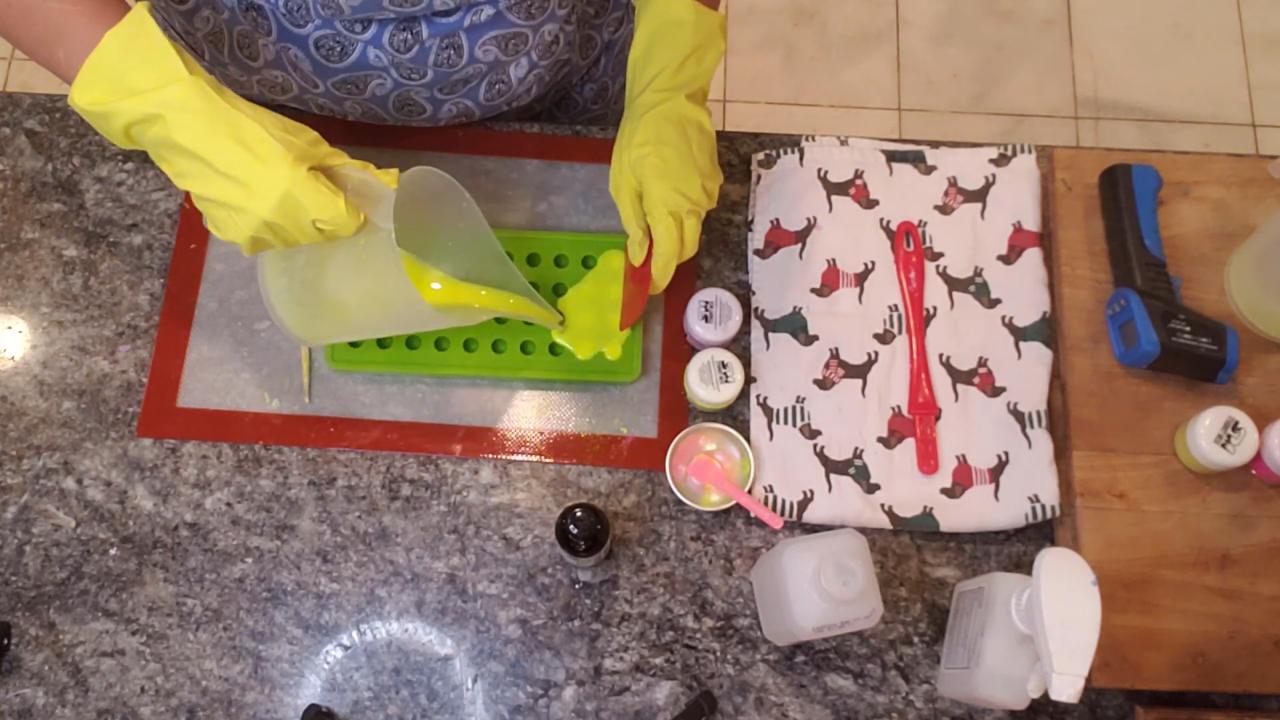 Squeegeeing soap into the ball mold cavities