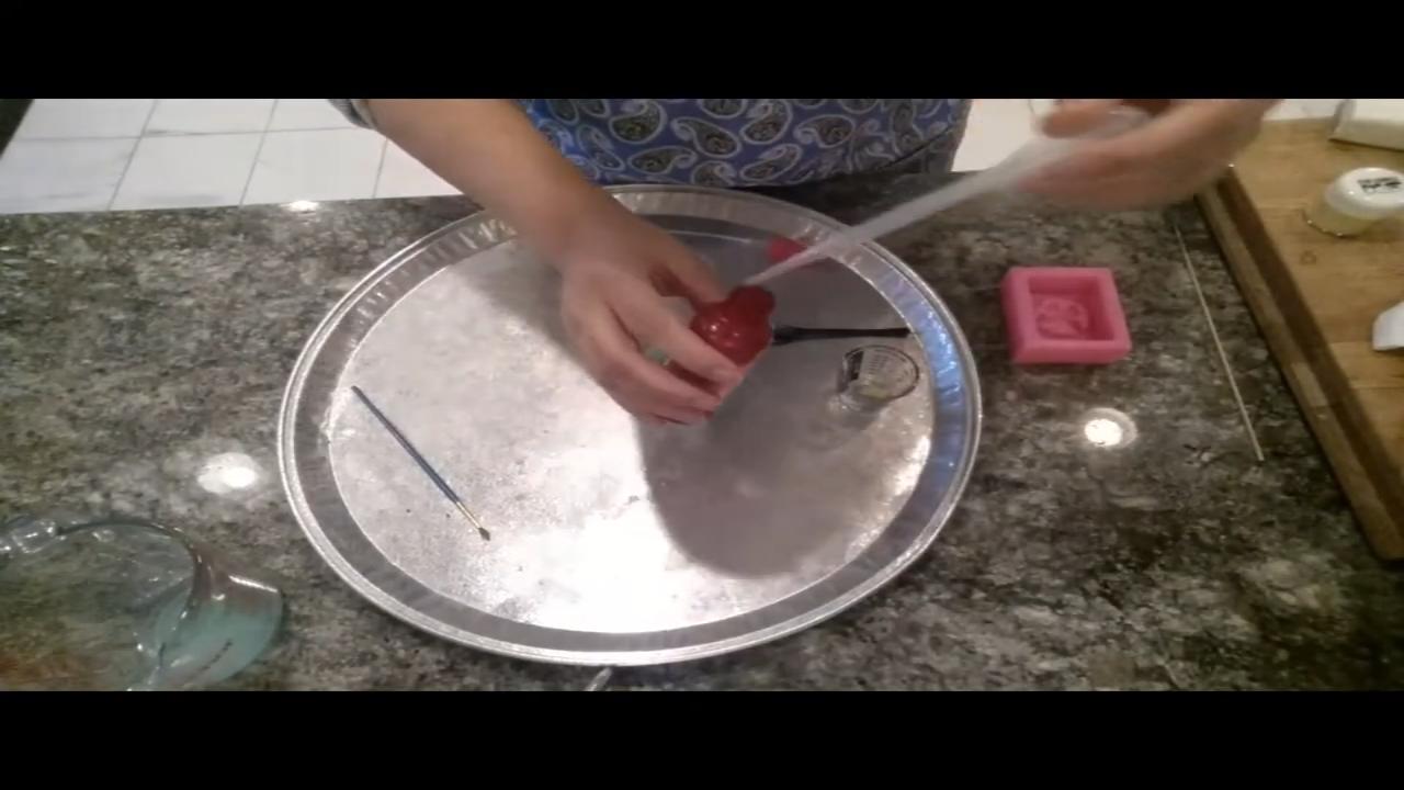 Painting the butterfly soap with mica and alcohol