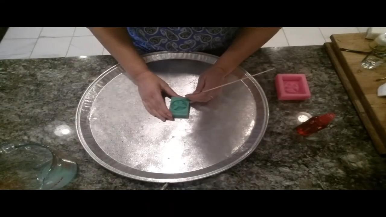Touching up the soap lettering with a skewer