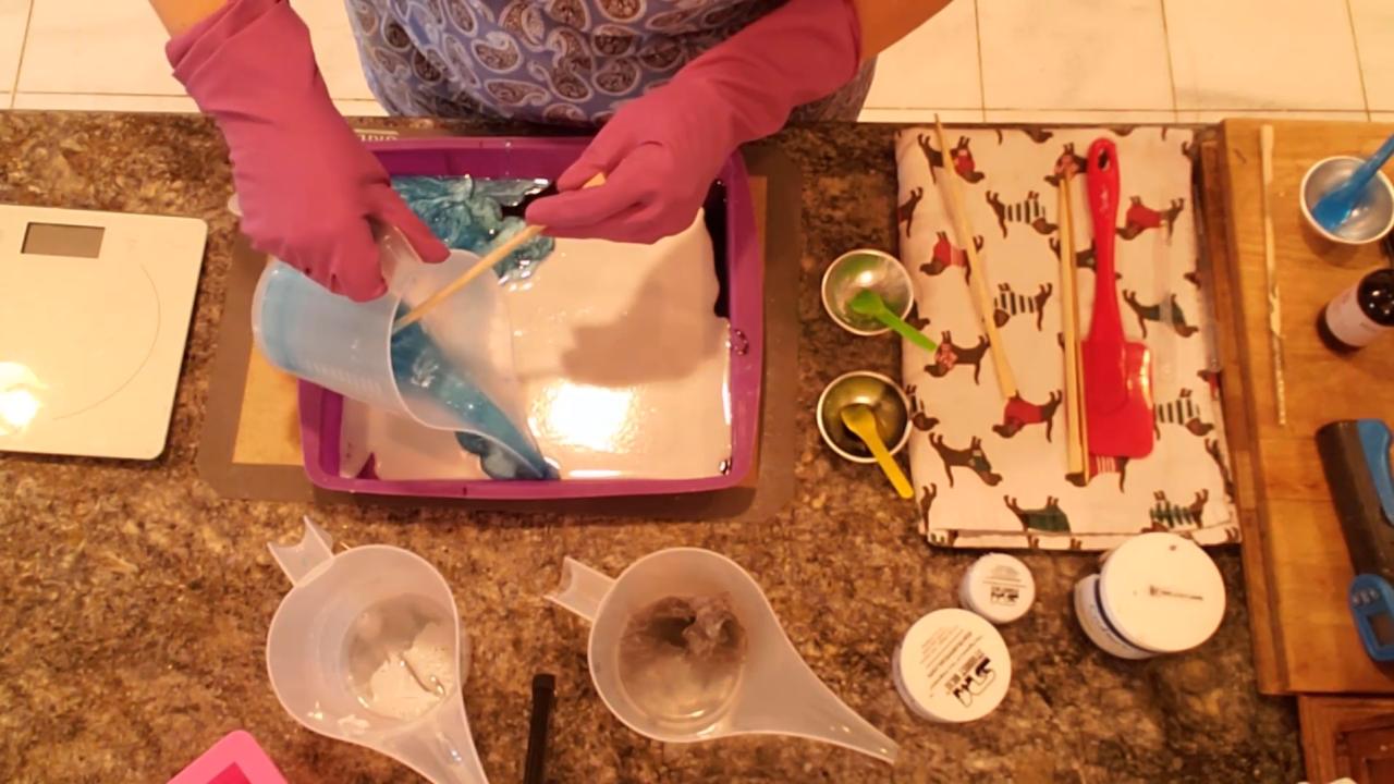 Pouring blue soap around the edges of the slab