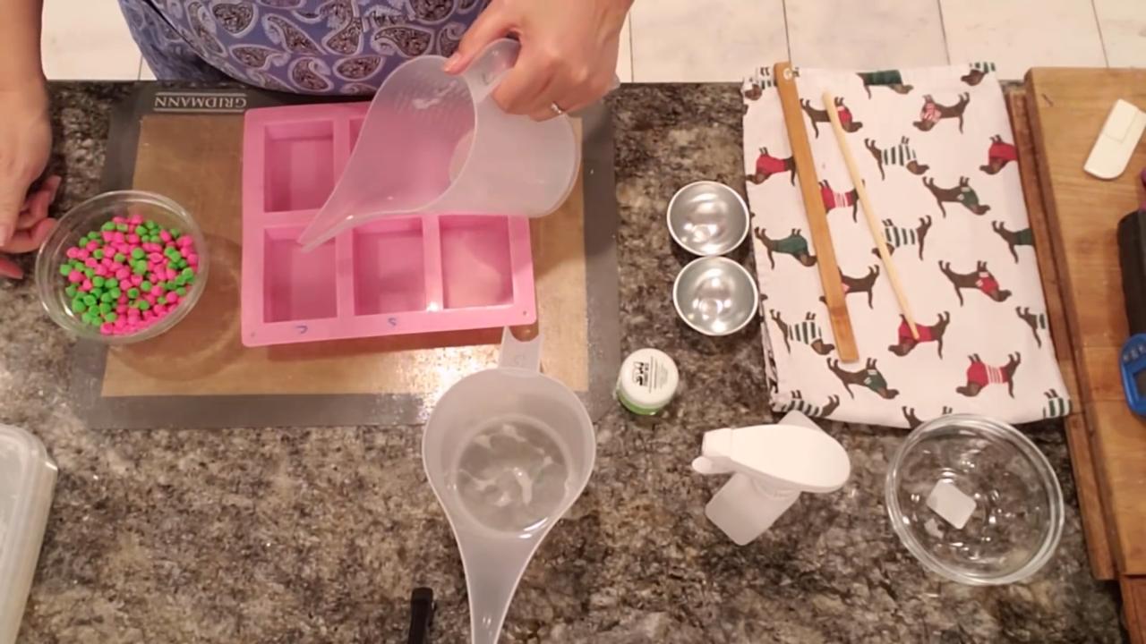 Pouring a thin bottom layer of clear soap
