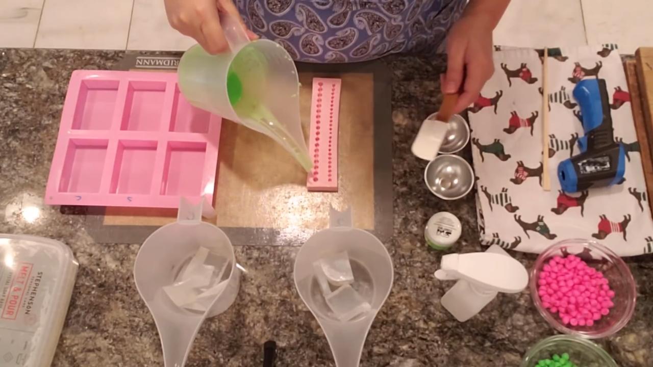 Pouring neon soap into a bead fondant mold