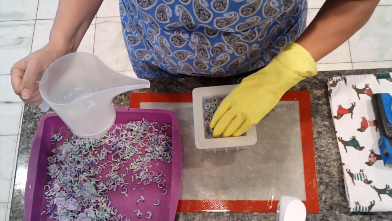 Layering clear soap and confetti in the mold