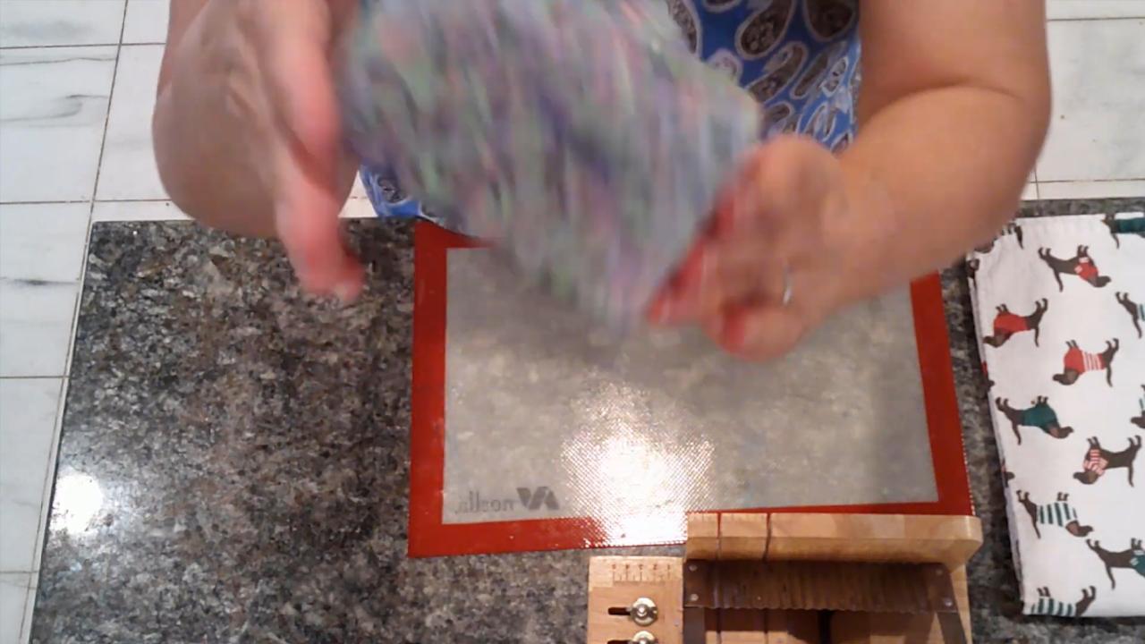 Unmolded confetti in clear soap loaf