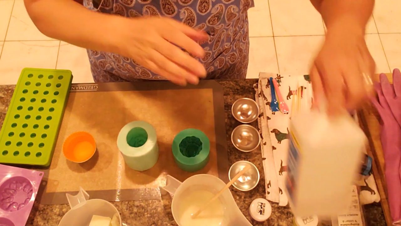 Silicone cupcake soap molds set in bath bomb holders to keep them steady