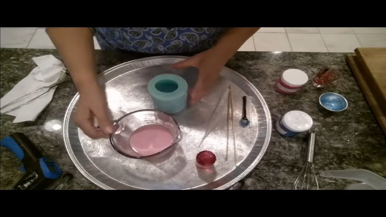Cupcake mold filled with pink cake soap