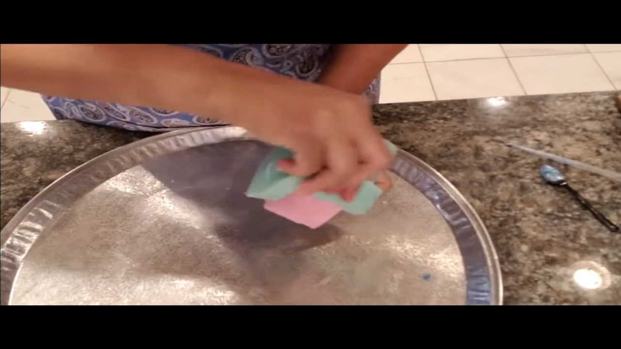 Peeling the silicone mold off the cupcake soap