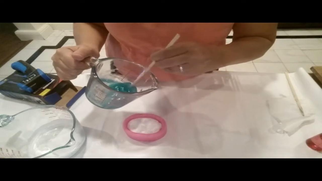 Pouring aqua soap over the dolphin layer