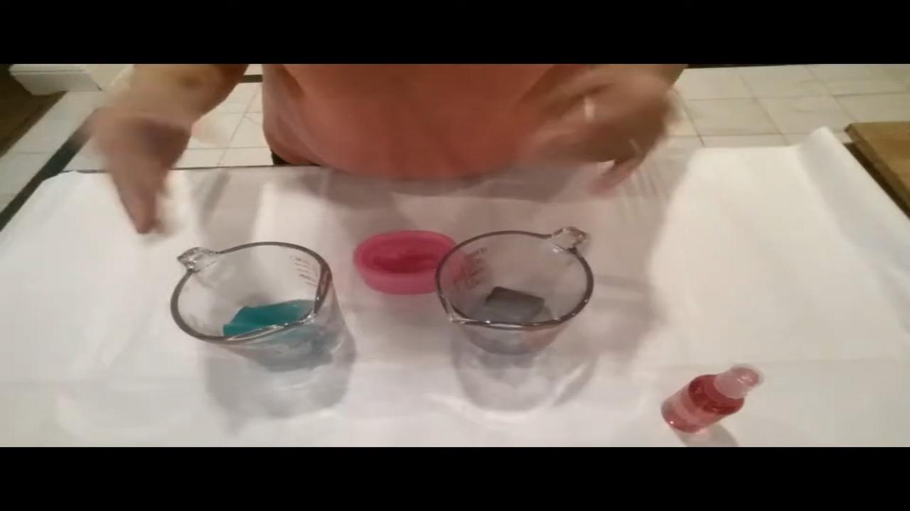 Remelted gray and aqua soap and a dolphin mold