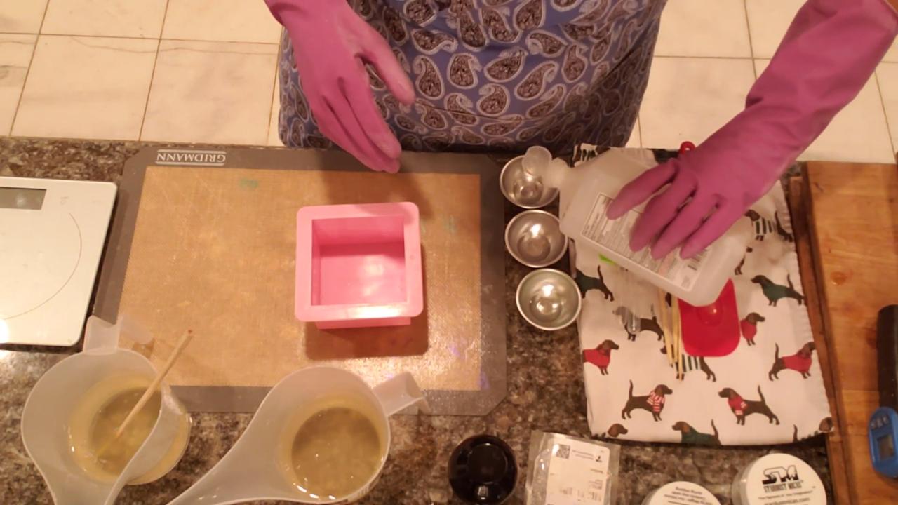 Melted clear soap base in two pour cups