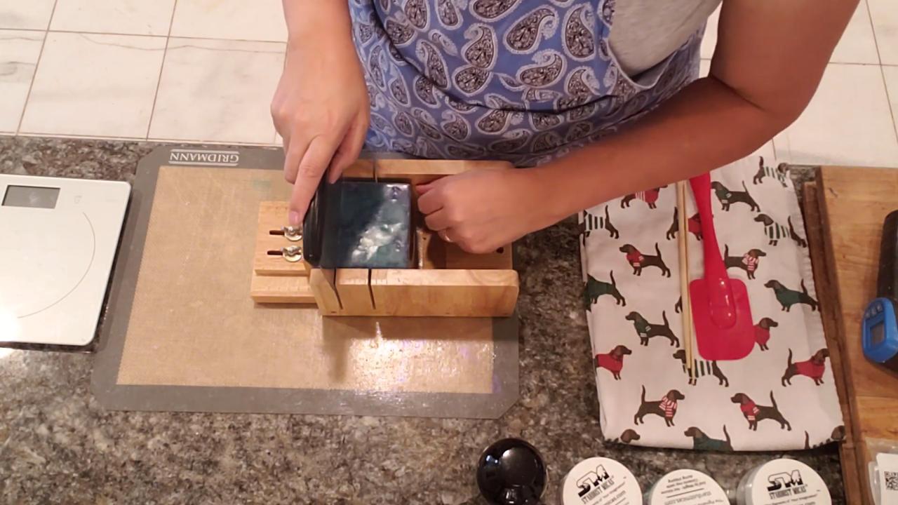 Unmolded Evil Queen soap loaf in the cutter