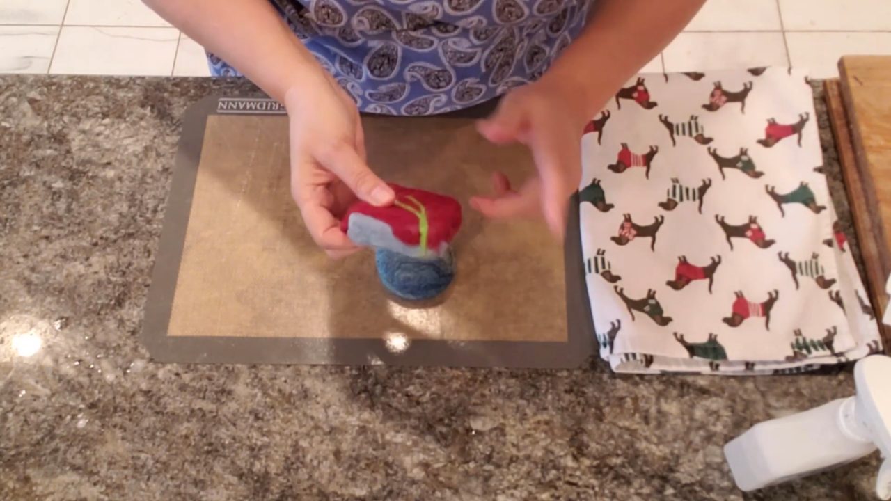 Felted soap with a colorful wool design