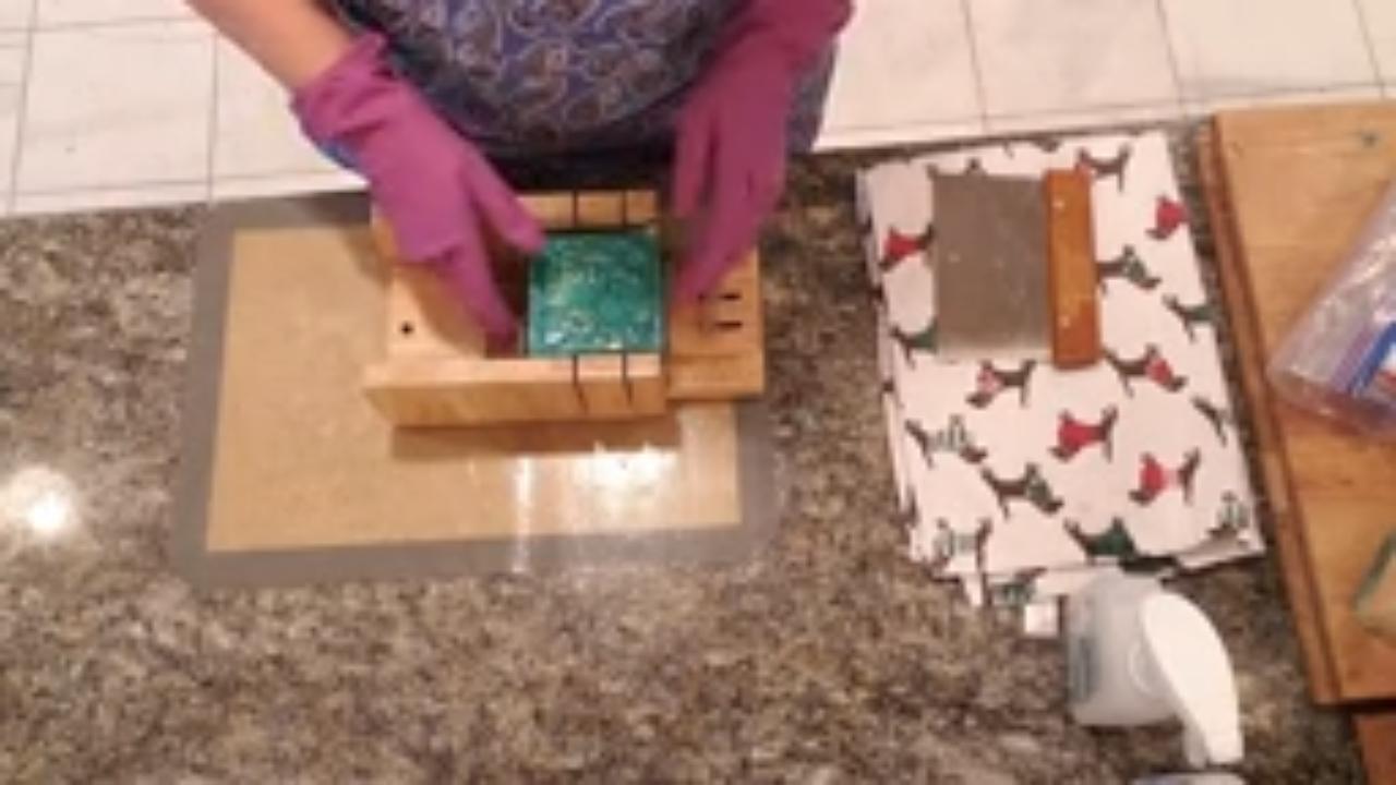 Cutting the Frosty Sunrise soap loaf
