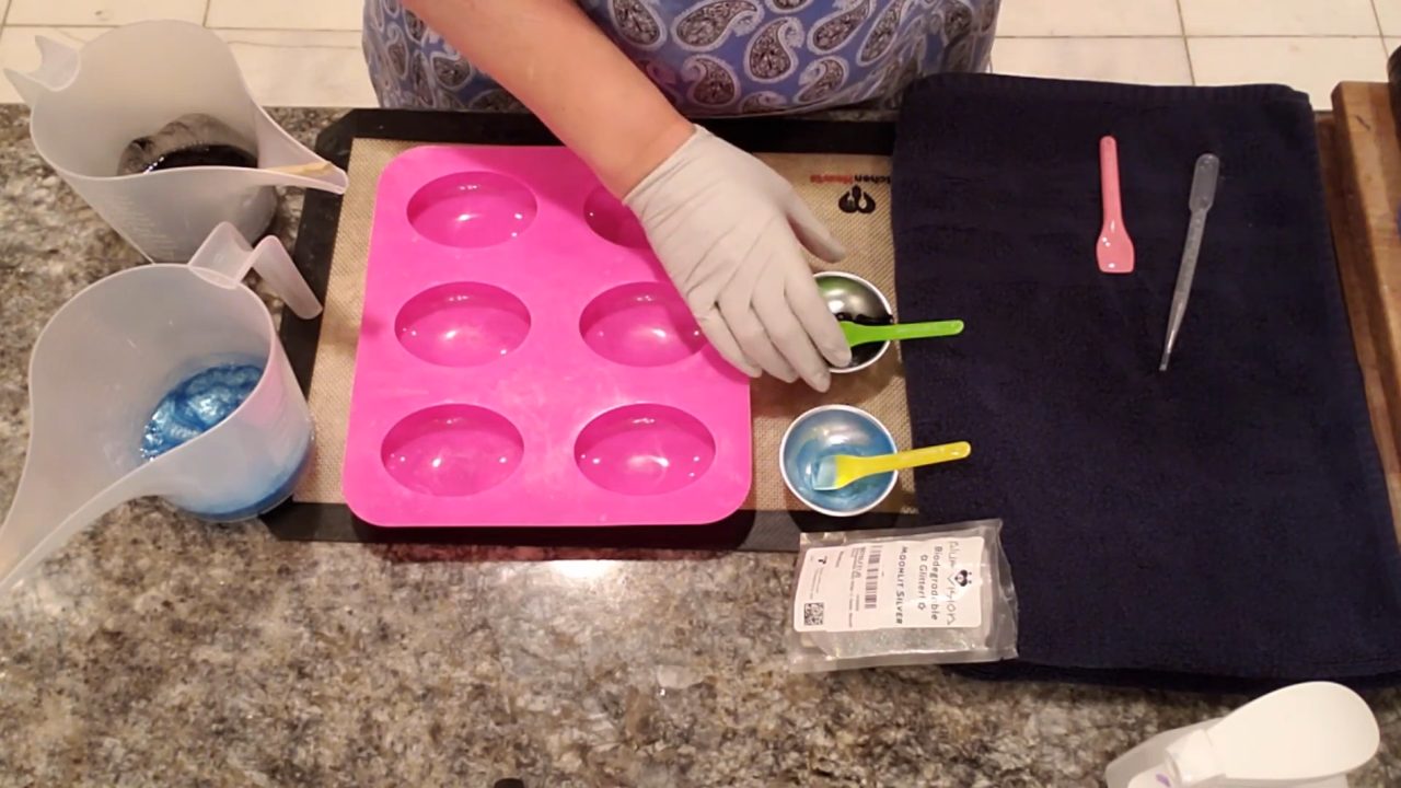 Mixing activated charcoal into clear melt and pour soap