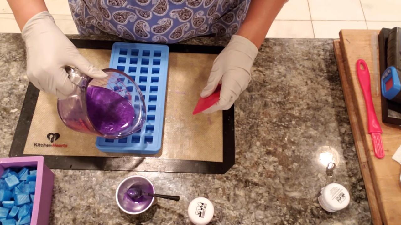 Pouring purple soap into the embed mold