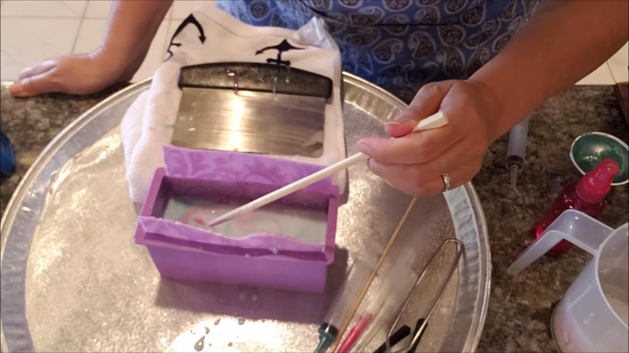 Swirling the soap with a chopstick