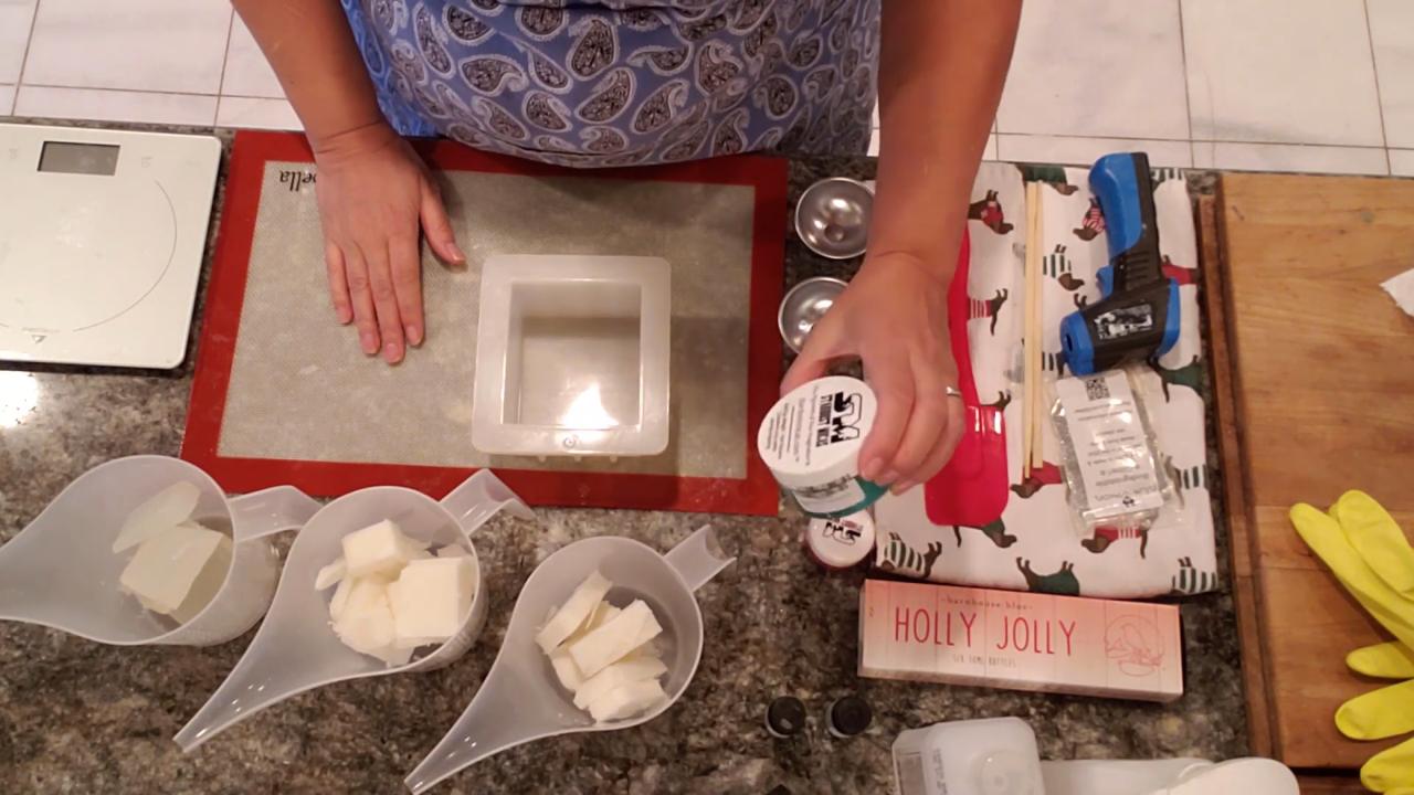 Melted shea butter and clear soap base ready for holiday swirl soap