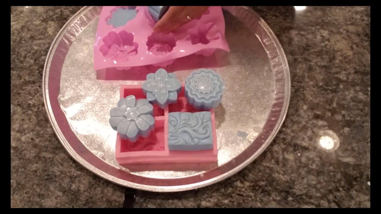 Finished blue kaolin clay melt and pour soaps in flower shapes