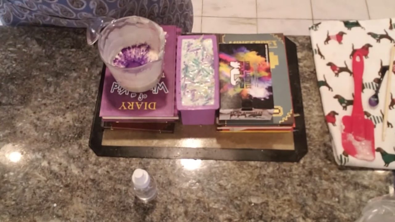 Whipping Melt Whip and Pipe soap frosting next to the confetti loaf