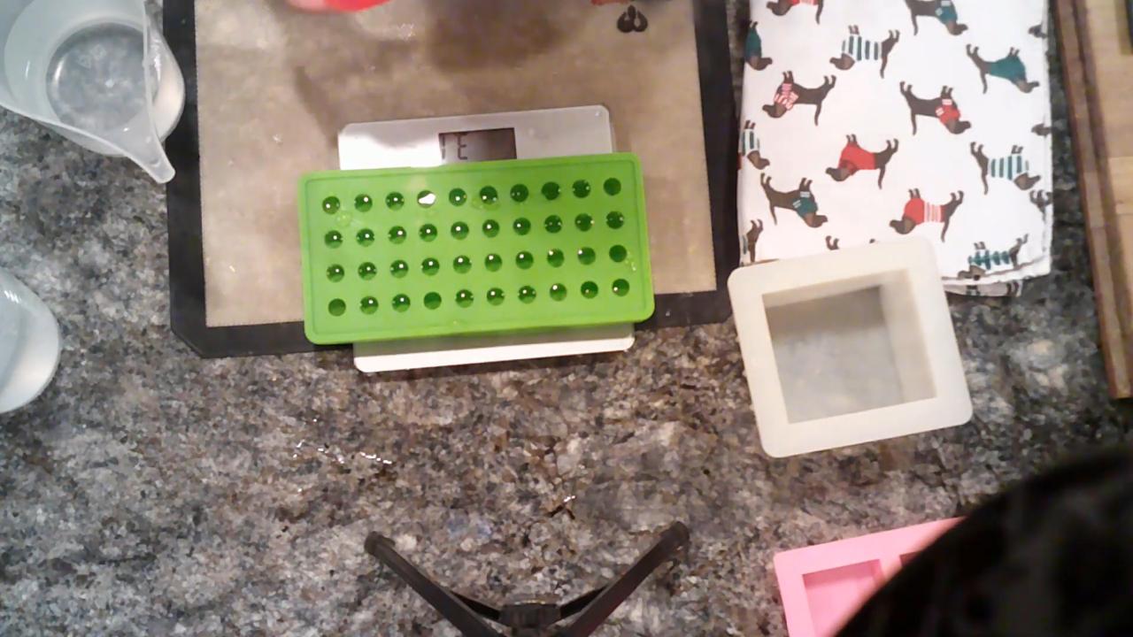 Ball mold filled with water on the scale