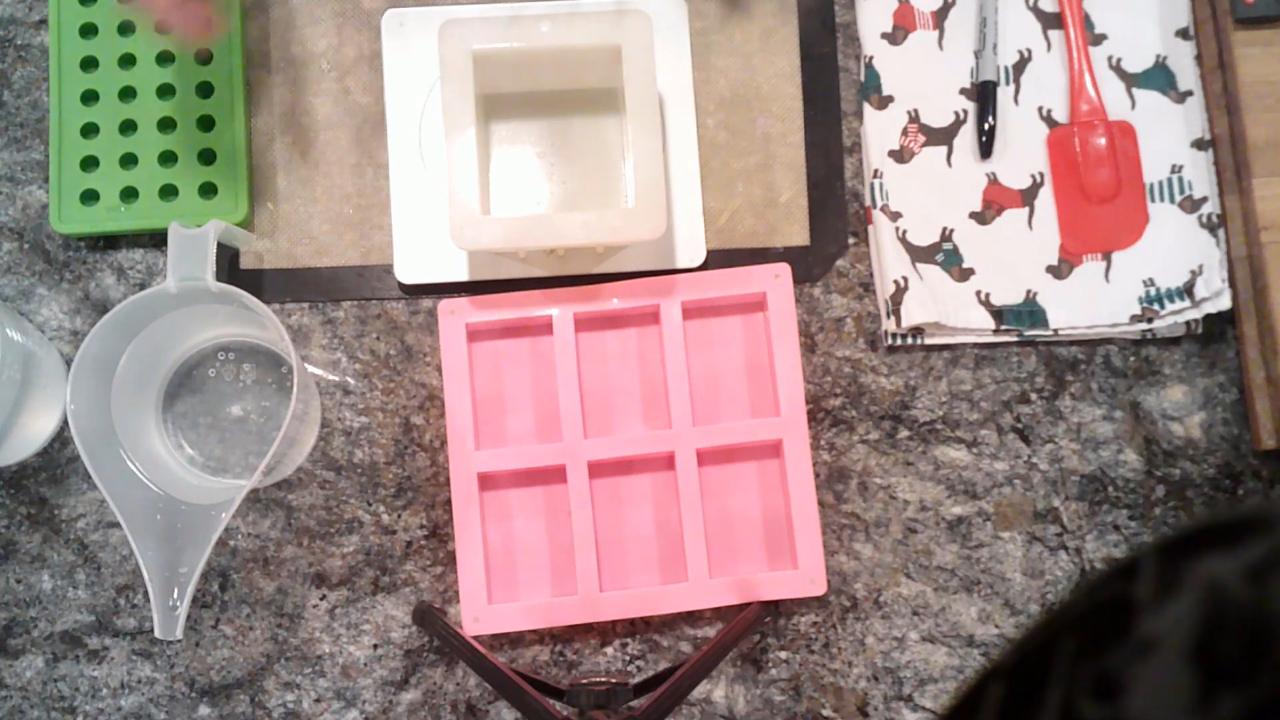 Square soap mold on a zeroed kitchen scale