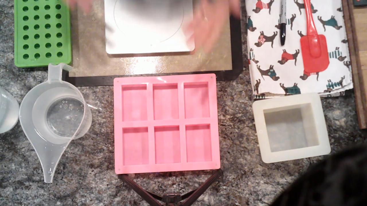 Soap molds, a kitchen scale and pour cups