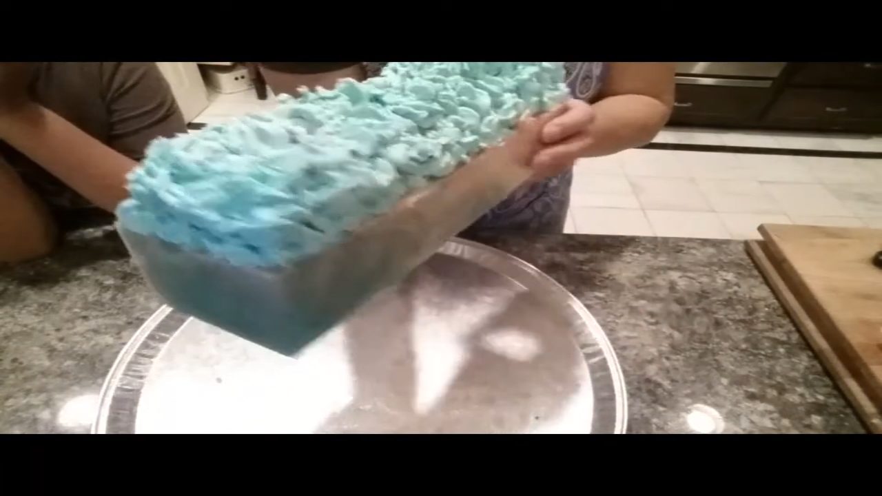Finished soap loaf with a tall piped Melt Whip and Pipe frosting top