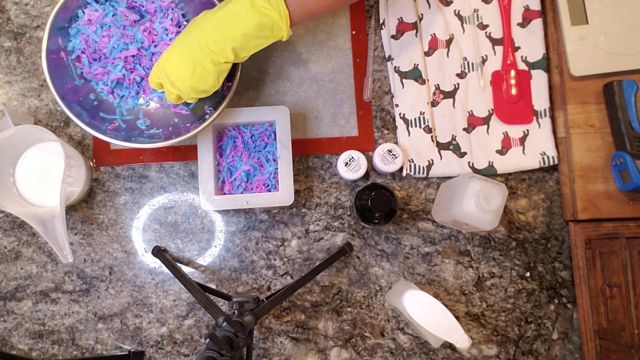 Pressing neon soap confetti into the mold
