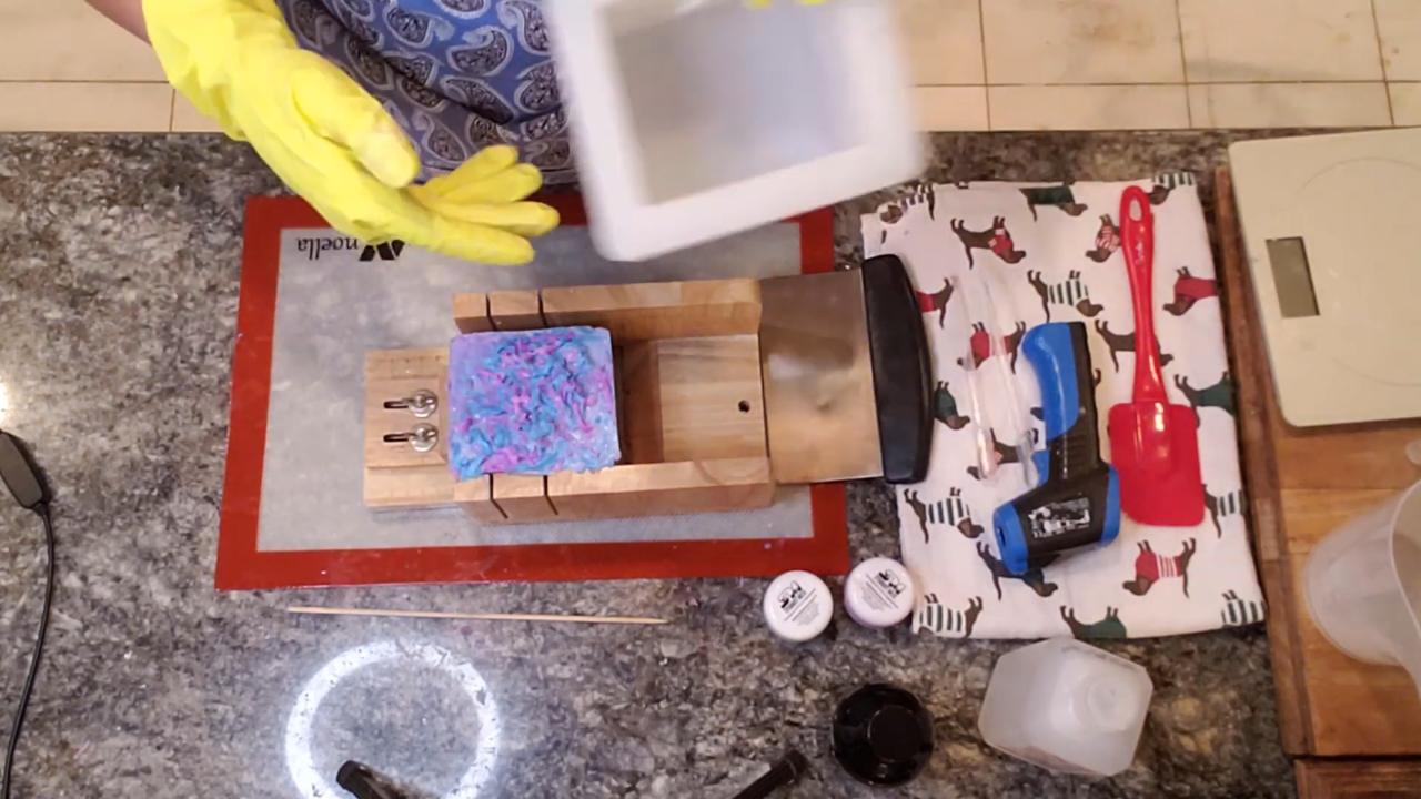 Cutting the neon confetti soap into bars