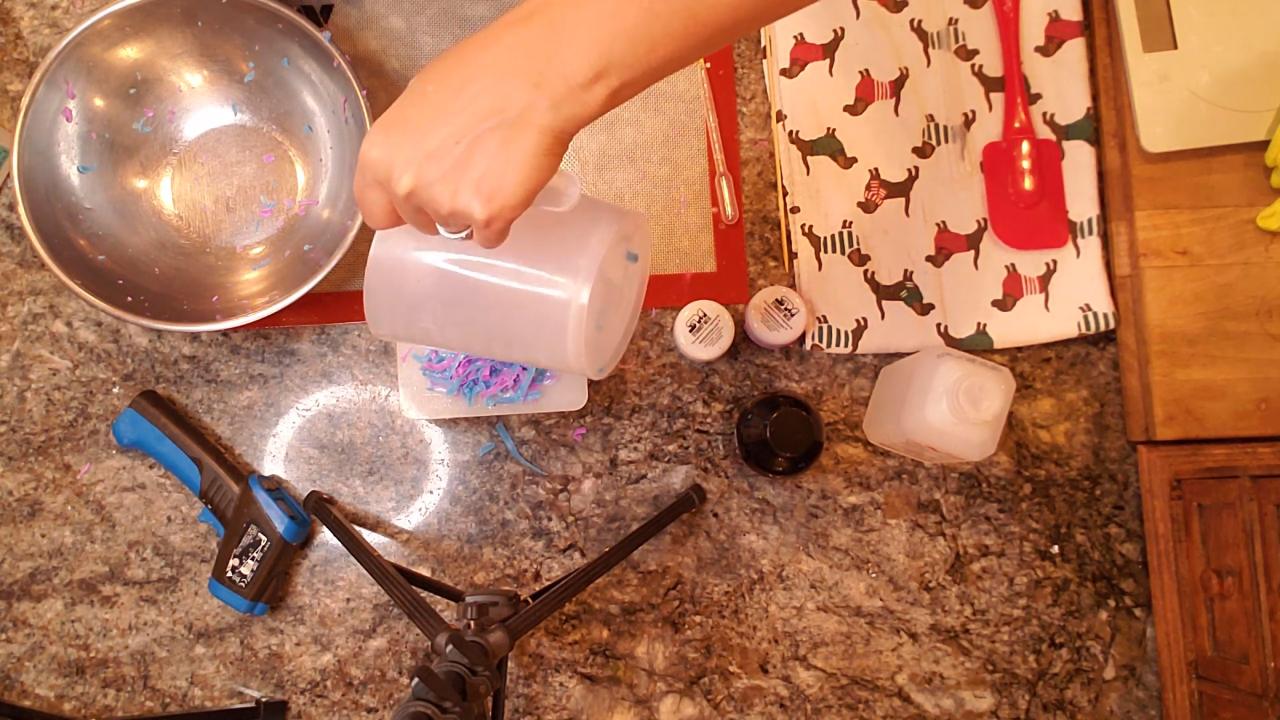 Pouring the white top layer over the confetti