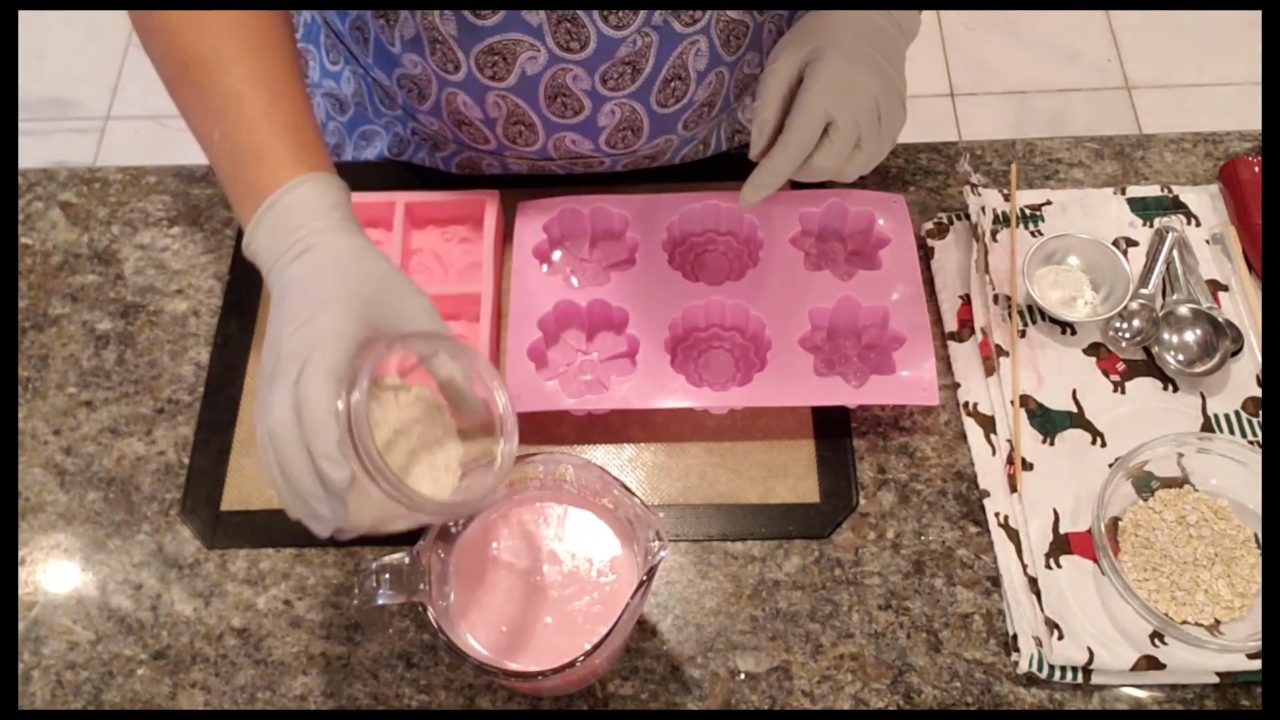 Adding ground oatmeal and kaolin clay to cooled shea butter melt and pour soap