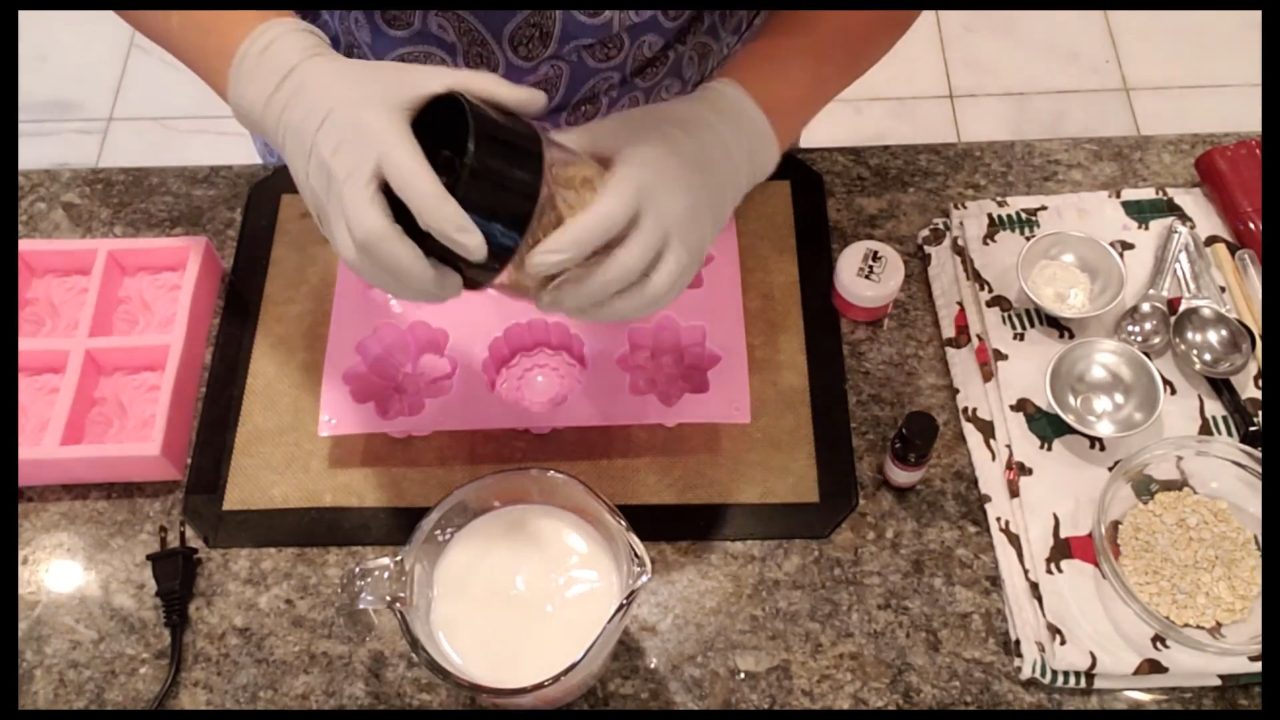 Grinding oatmeal into a fine powder in a small blender for melt and pour soap