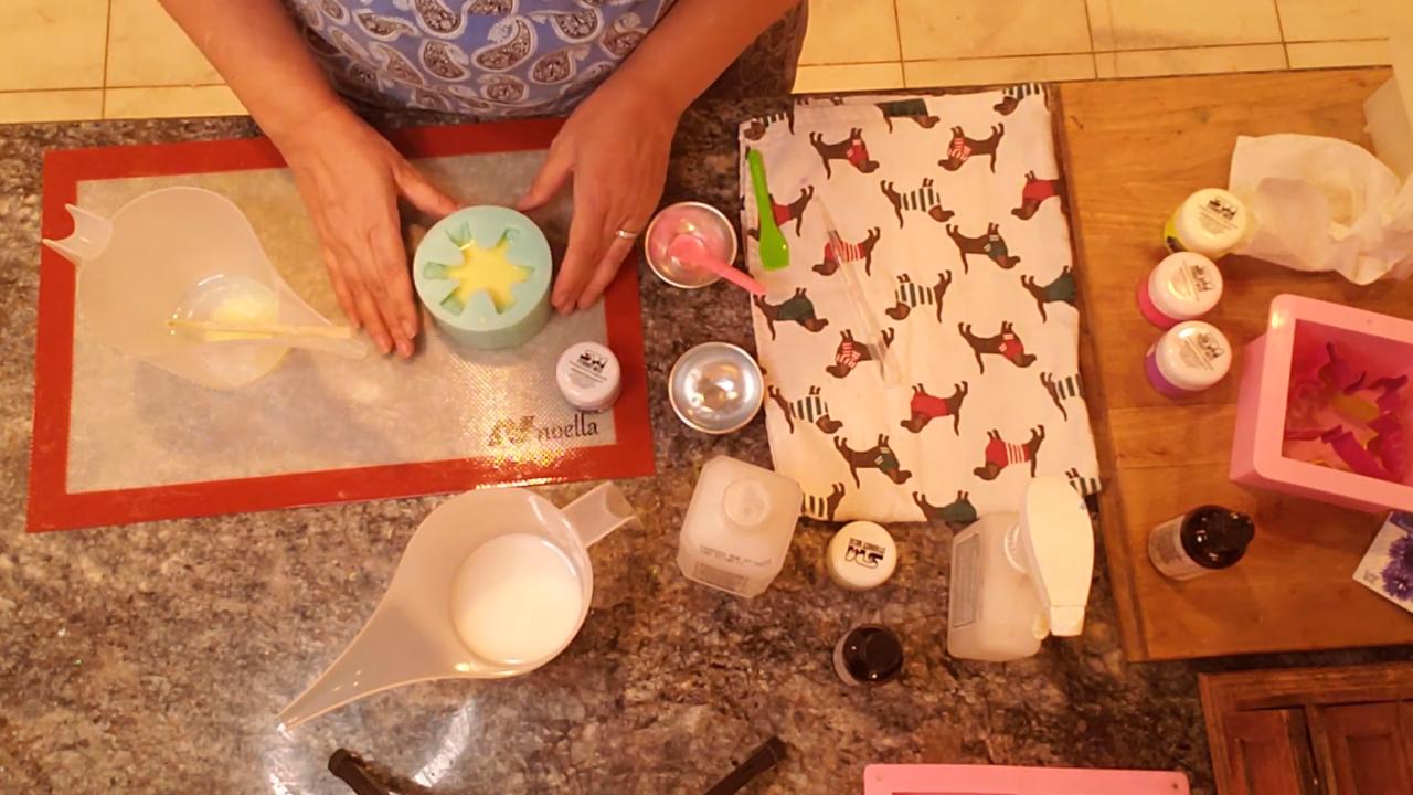 Pouring a thin yellow layer into the orchid mold