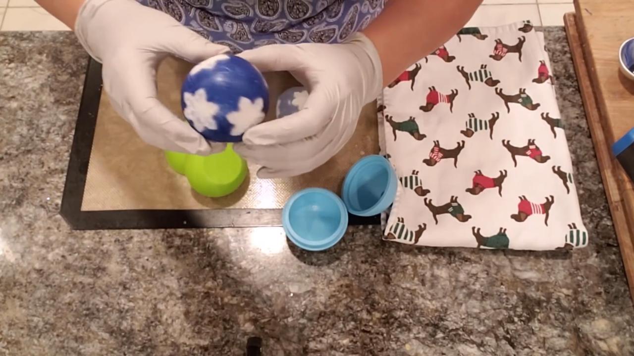 Dark blue ornament ball soap with snowflakes