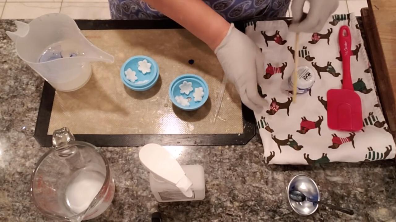 Mixing Blue Ice mica and glitter into clear soap